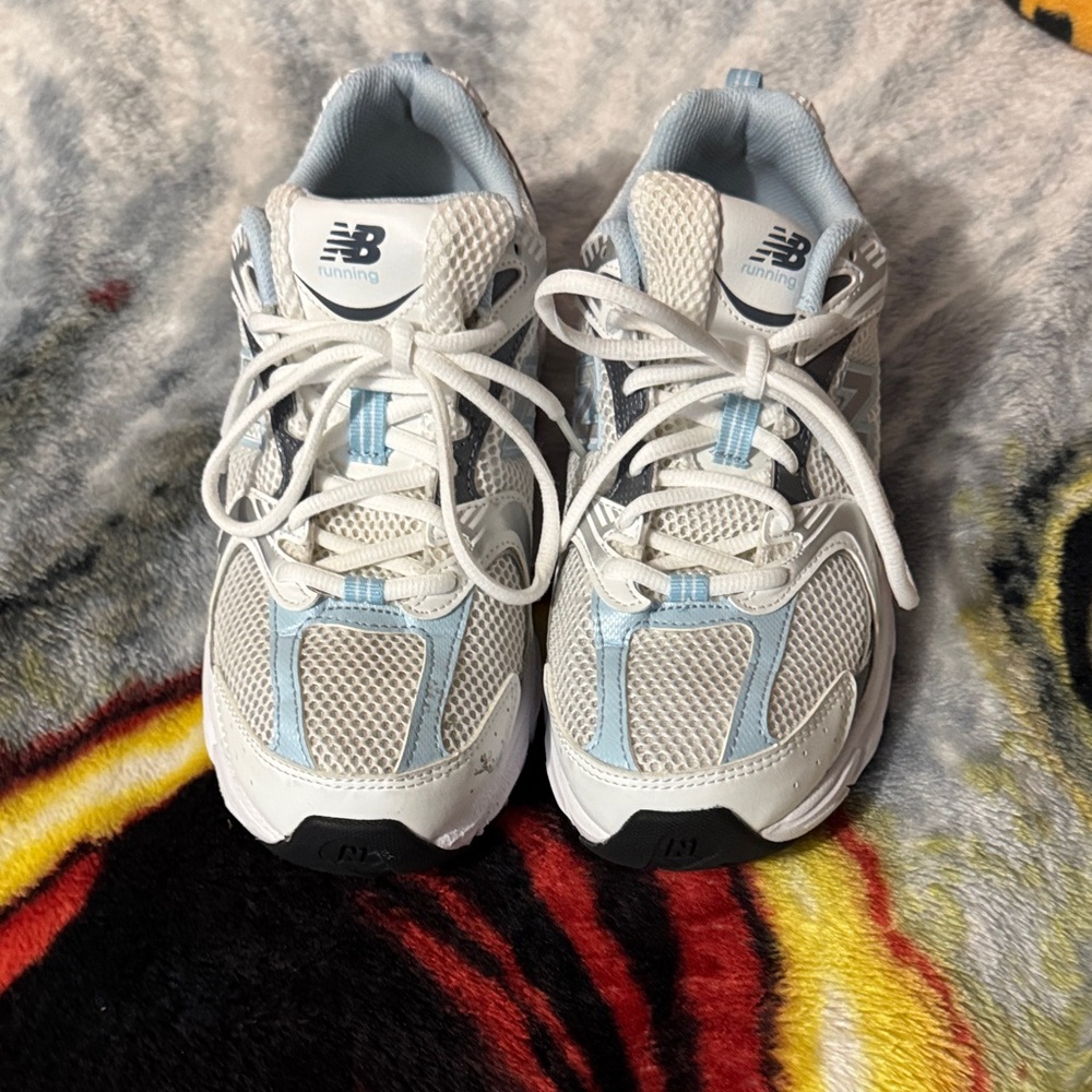 New balance light blue and white